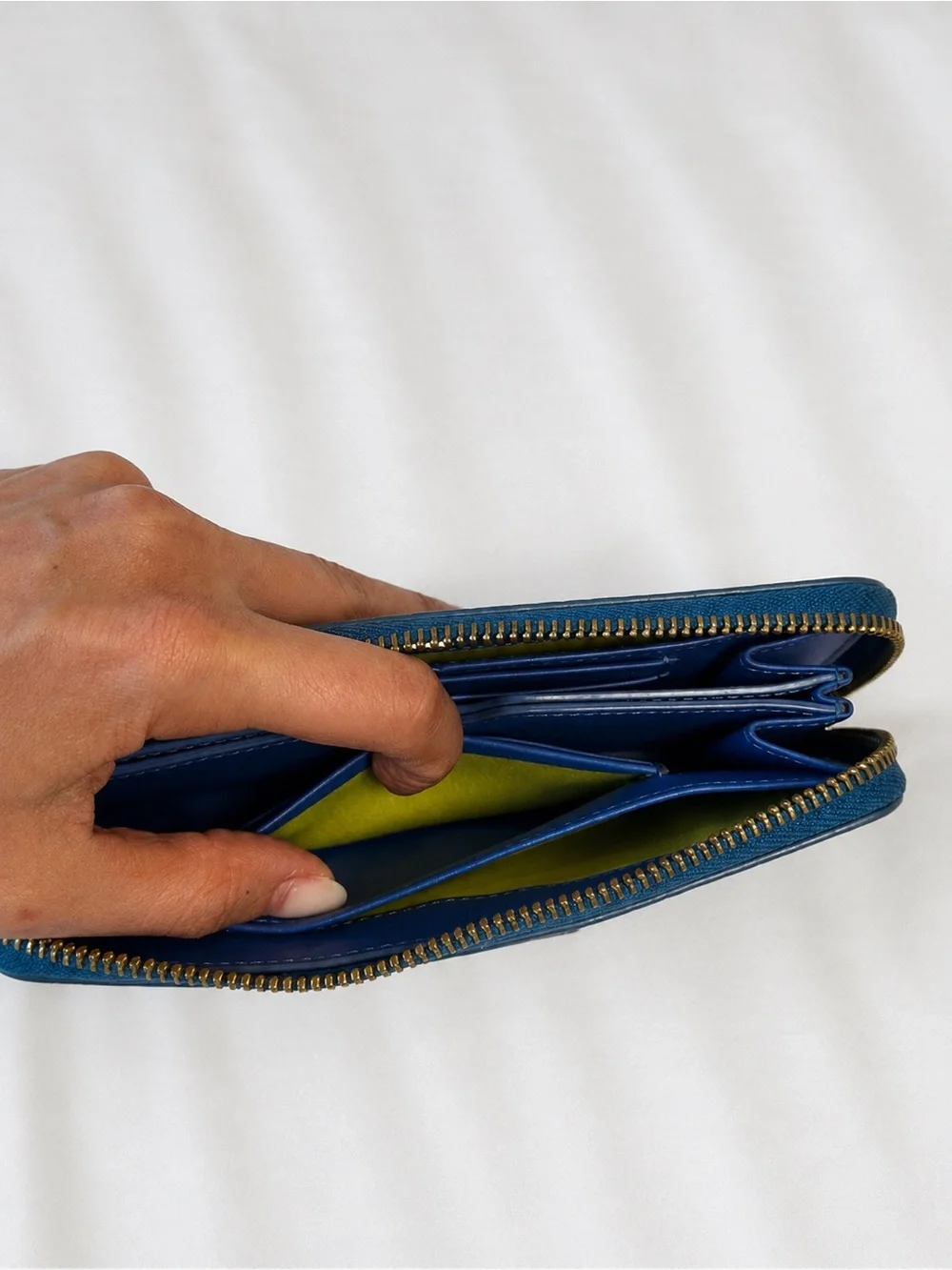 Kelly Wynne Blue Silver Embossed Zip Around Wallet Metallic